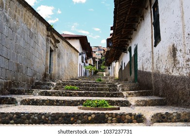 Colonial Staircase In The Beautiful Town Of Cajamarca, In Peru. Small Stones Walk Uo Towards The Blue Sky Where Colonial Meets Tradition.