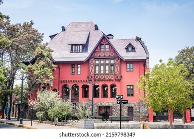 Colonial Style House With Sky And Blue Background