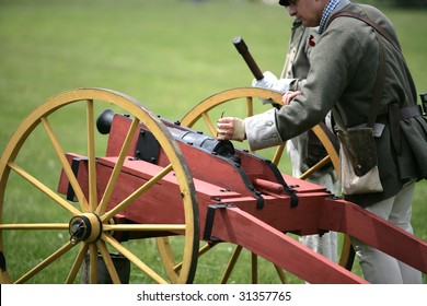 COLONIE - MAY 16: French And Indian War Reenactment Members Prepare To Fire A Cannon At The Schuyler Flats Cultural Park May 16, 2009 In Colonie, NY