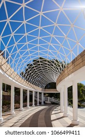 colonnade with openwork ceiling.