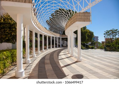 colonnade with openwork ceiling.
