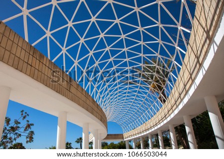 colonnade with openwork ceiling.