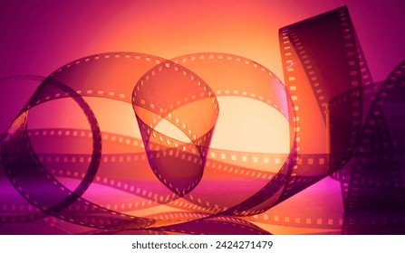 color abstract background with film strip. film festival film production announcements premieres concept - Powered by Shutterstock