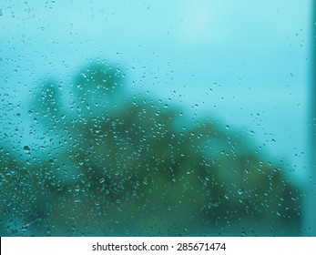 Color abstract blurred backgrounds with drops of water on glass. - Shutterstock ID 285671474