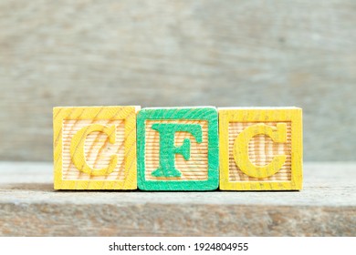 Color Alphabet Letter Block In Word CFC (abbreviation Of Chlorofluorocarbon) On Wood Background