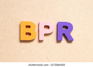 Color Alphabet Letter In Word BPR (Abbreviation Of Business Process Reengineering Or Batch Processing Record) On Wood Background