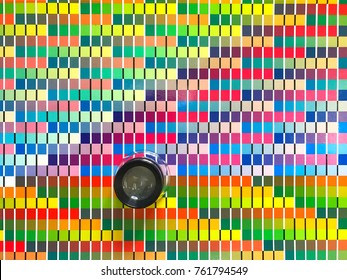 Color chart with measurement tool. Checking colors with equipment. Printing factory tools.