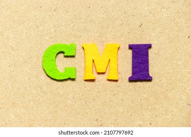 Color Cloth Alphabet Letter In Word CMI (Abbreviation Of Cost Management Index, Co-managed Inventory,Customer Managed Inventory Or Case Mix Index) On Wood Background