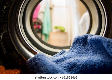 Color Clothes In Washing Machine. Inside View