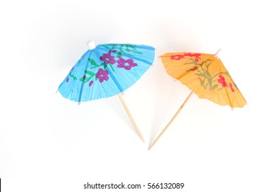 Color Cocktail Umbrellas On White Background