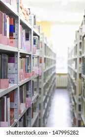 Color Coded Filing System On Library Shelves