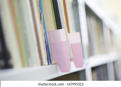 Color Coded Filing System On Library Shelves