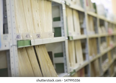 Color Coded Filing System On Library Shelves