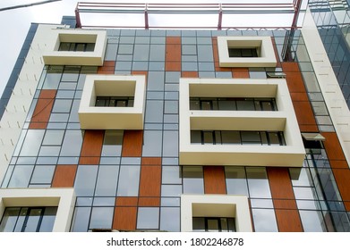 Color Construction Aluminum.Facing The Building With A Ventilated Facade. Aluminum Colored Facades. Modern Facades Construction Of A Comercial Centre