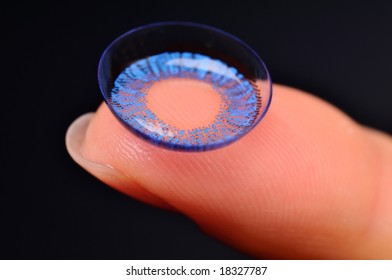 Color Contact Lens On A Finger