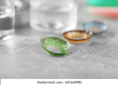 Color Contact Lenses On Grey Table