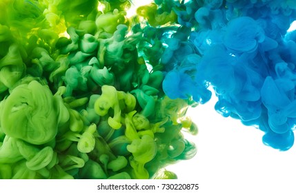 Color drop in water close up - Shutterstock ID 730220875