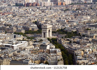 Color DSLR Picture Of The Arc De Triomphe In Paris, France, Designed By  Jean Chalgrin, Shot From Above With Part Of The Paris Skyline; In Horizontal Orientation With Copy Space For Text