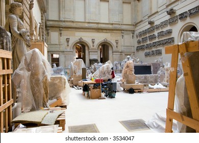 Color DSLR picture of a bright sunlit fine art storage room at the Louvre Museum, Paris, France, a famouse tourist destination and landmark. Horizontal with copy space for text.