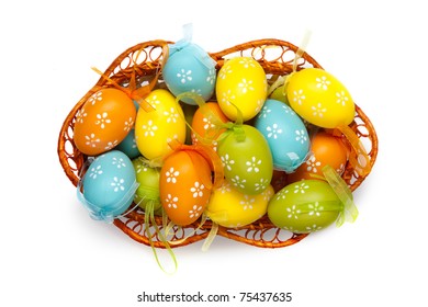 Color Easter Eggs In Basket Isolated On White. Top View