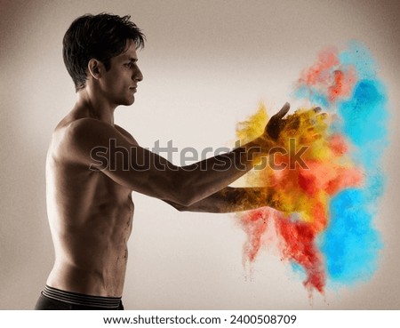 Color, explosion and man with powder in hands with creativity, performance and studio. Vibrant, paint and shirtless model with bold cloud with blue, red and yellow smoke in background or backdrop