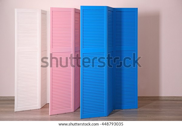 Color folding screens in\
room