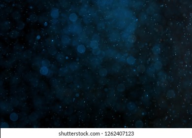 Color Glitter On Dark Background. Bokeh Effect