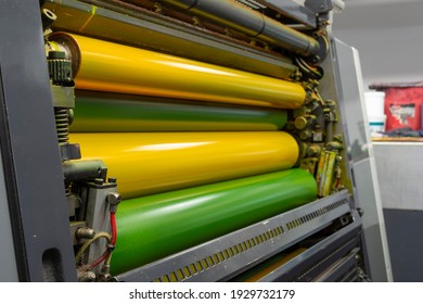 Color and glossy rollers of offset printing machine. offset ink colour. Komori lithrone. Yellow
