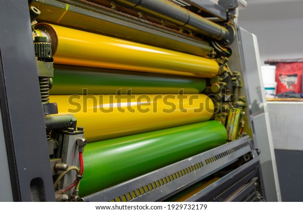Color and glossy rollers of\
offset printing machine. offset ink colour. Komori lithrone.\
Yellow