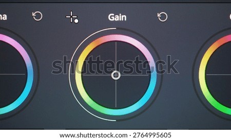 Color grading control panel. Close up of professional video color grading tools on a monitor. RGB waveform scopes hue controls color wheels adjustments. Editing post production and filmmaking concepts