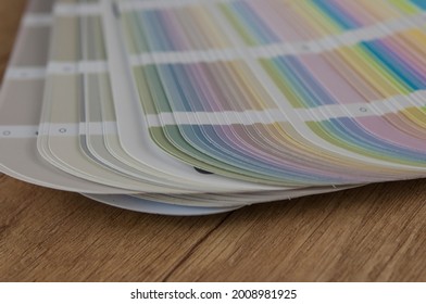 Color guide spectrum swatch samples soft colorful on wood background
