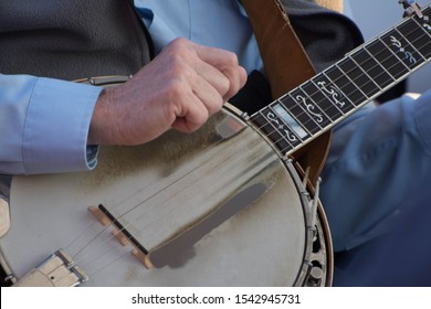 Color Image Of Banjo Being Played In Blue Grass Music Band