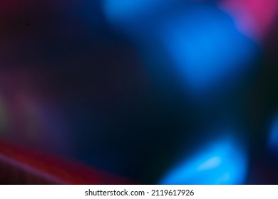 Color lens flare. Futuristic background. Blur fluorescent uv led illumination. Defocused neon blue pink light on dark abstract overlay. - Shutterstock ID 2119617926