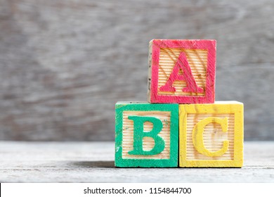 Color Letter Block In Word Abc On Wood Background