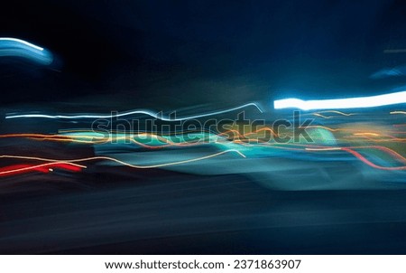 Color line with black background. Car Light Painting. Neon color with black background. Lightpainting in different colors.