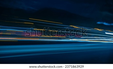 Color line with black background. Car Light Painting. Neon color with black background. Lightpainting in different colors.