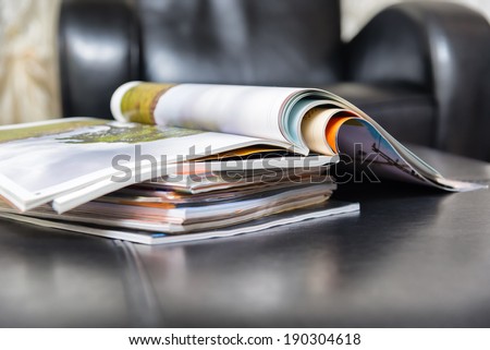 Color magazines in leather living room
