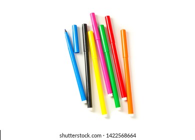 Color markers isolated on white background, top view