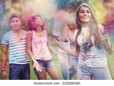 Color me FUN. Shot of happy friends having fun with powder paint. - Shutterstock ID 2230285681
