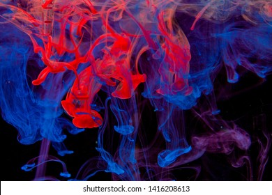 Color paint drops in water. Ink swirling underwater. Cloud of silky ink collision on black background. Colorful abstract smoke explosion animation. Close up camera view. - Shutterstock ID 1416208613