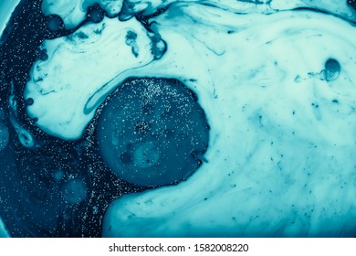 Color Paint Drops In Water. Ink Swirling Underwater. Cloud Of Silky Ink Collision On White Background. Colorful Abstract Smoke Explosion Animation. Close Up Camera View.