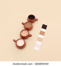 Color palette and different shades coffee in red mugs  flat lay coffee shop concept