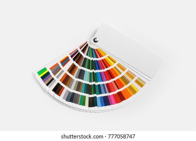 Color palette on white paper background. Guide of paint samples. Colored catalog. Flat lay.