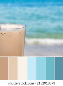 Color palette swatches of brown cold coffee frappe drink on blurred blue sea background. Pastel trendy combination of creamy milk beige and turquoise aqua teal colors, inspired by hot summer holidays.