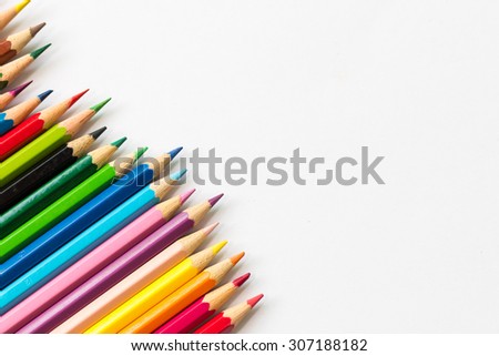 Color pencil with copy space isolated on whtie background,education frame concept.