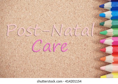 Color Pencil At The Side Of A Brown Board, With A Message On The Board. Post Natal Care