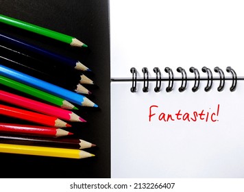 Color Pencil And White Notebook With Handwritten Text FANTASTIC!, To Praise Someone For Something They Have Done Well - Boss Recognizing Employees Or Teacher To Students For Doing Good Work