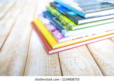 Color Photo Of Large Stack Of Paper Books. Photobook Album With Photos