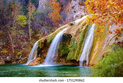 Color photograph of Turner Falls waterfall (near Davis, Oklahoma) during fall / autumn. 