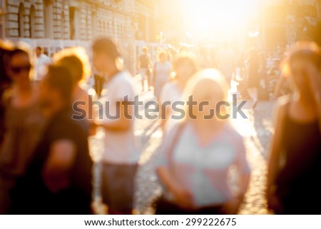 Color picture of blurred town scene at sunset